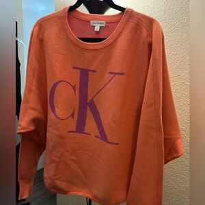 Calvin Klein Jeans Vibrant Orange Sweater with Purple Detail